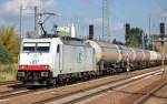 ITL E 186 138 mit Ganzzug Gasdruckkesselwagen f�r Ammoniakbef�llung bei der Durchfahrt im Bhf.