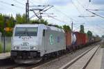 ITL 185 562-6 mit Containerzug Richtung Nordosten am 07.07.14 Durchfahrt Bhf.