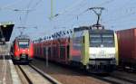 ITL 152 197-0 mit einem PKW-Transportzug VW-Nutzfahrzeuge am 29.10.15 Durchfahrt Bhf.