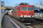 MEG 701 (155 124-1) mit dem täglichen Leerzug Zementstaubwagen Richtung Industrieübergabegebiet Berlin Nordost am 11.11.14 Berlin-Hohenschönhausen.