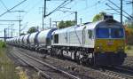 MEG mit 077 012-8 und einem Zementstaubzug am 01.10.15 Bhf.