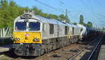 MEG mit der ECR Doppeltraktion 077 012-8 + 077 023-5 (F-MEG) und Zementstaubzug Richtung Rostock am 01.06.17 Bf.
