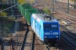 PRESS 145 030-7 mit Leerzug Rungenwagen (Holztransporte) Richtung Nordosten, 29.10.12 Berlin-Beusselbr�cke.