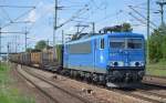 PRESS 155 045-9 mit Leerzug Transportwagen für Stammholztransporte bei der Durchfahrt Bhf.