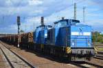 PRESS Doppeltraktion 204 011-5 (203 212-6) + 204 012-4 (203 215-89) mit Holzzug bei der Duchfahrt Bhf.