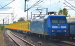 RESS 145 030-7 (145 085-7) mit genau diesen fabrikneuen Drehgestell-Flachwagen die auf der InnoTrans aktuell präsentiert wurde angemietet von TRANSWAGGON vom Typ Snps entgegen, dadurch das diese