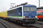 PRESS/IntEgro 155 045-9 (155 238-9) mit einem Leerzug Drehgestell-Rungenwagen vom Typ Snps für den Transport von Holzstämmen angemietet für die Fa.