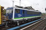 Überraschend stand PRESS 155 048-6 mit einem Ganzzug Stammholz-Transportwaghen am S-Bhf.