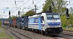 RTB Cargo - Rurtalbahn Cargo GmbH, Düren [D] mit der geleasten Railpool Lok  186 426-3  [NVR-Nummer: 91 80 6186 426-3 D-Rpool] und einem Containerzug Richtung Frankfurt/Oder am 23.04.25 Höhe