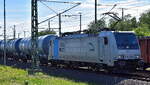 Zug-Pilot GmbH, mit der geleasten Railpool Lok  E 186 143-4  [NVR-Nummer: 91 80 6186 143-4 D-Rpool] und einem Kesselwagenzug (Ethanol) am 18.05.26 H�he Bahnhof Magdeburg Hbf.
