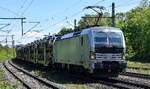 RFO - Rail Force One B.V., Rotterdam [NL] mit der geleasten Railpool Vectron   6193 185  [NVR-Nummer: 91 80 6193 185-6 D-Rpool] und einem PKW-Transportzug am 18.05.26 H�he Bahnhof Niederndodeleben.