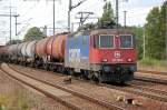 Re 421 389-8 mit Ganzzug Kesselwagen am 31.08.11 Bhf.