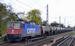 Re 421 397-1 für HSL mit Kesselwagenzug (geschmolzenes Schwefel) am 29.04.16 Berlin-Karow.
