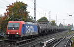 HSL mit Re 482 046-0 und Kesselwagenzug (leer) Richtung Stendell am 10.10.17 Berlin-Karow.