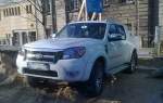 Ein FORD RANGER in weiß mit der Aufschrift WILDTRAK, geiles Teil am 25.02.14 in Berlin-Pankow.