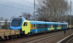Fabrikneuer vierteiliger FLIRT vom Stadler Werk Berlin-Pankow (94 80 1428 602-5 D-WFB) für die Westfalenbahn GmbH bei der Überführungsfahrt am 26.01.15 Mühlenbeck/Mönchmühle b.Berlin.